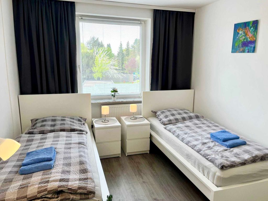 Ansicht Schlafzimmer I -mit Betten- Wohnung W4
