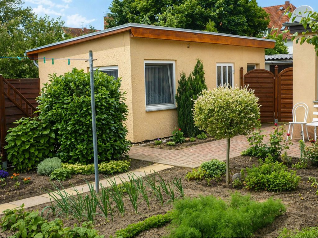 Bungalow mit Gartenterrasse neben dem Wohnhaus der Gastgeber