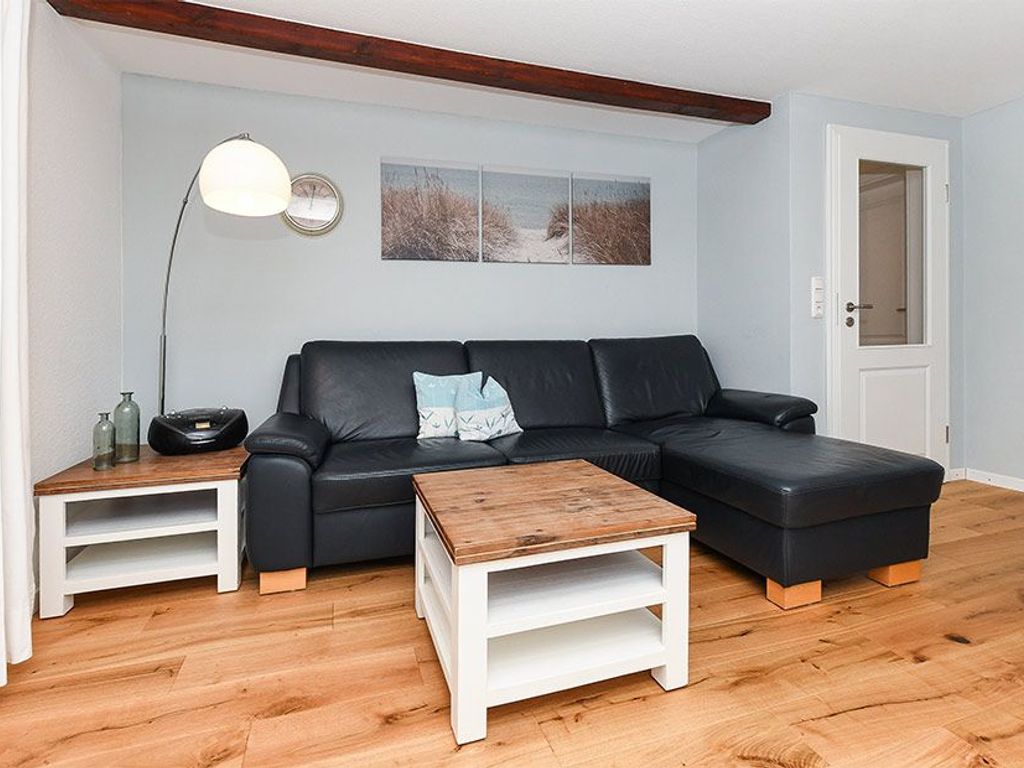Wohnzimmer mit integriertem Küchenbereich