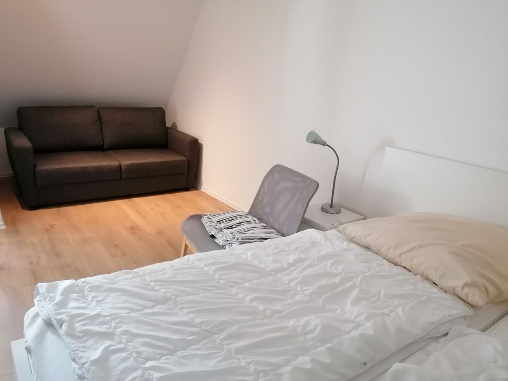 Zusätzliche Couch im Schlafzimmer