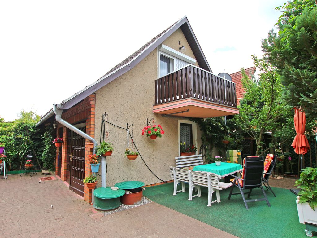 Ferienhaus mit Sitzecke und Balkon