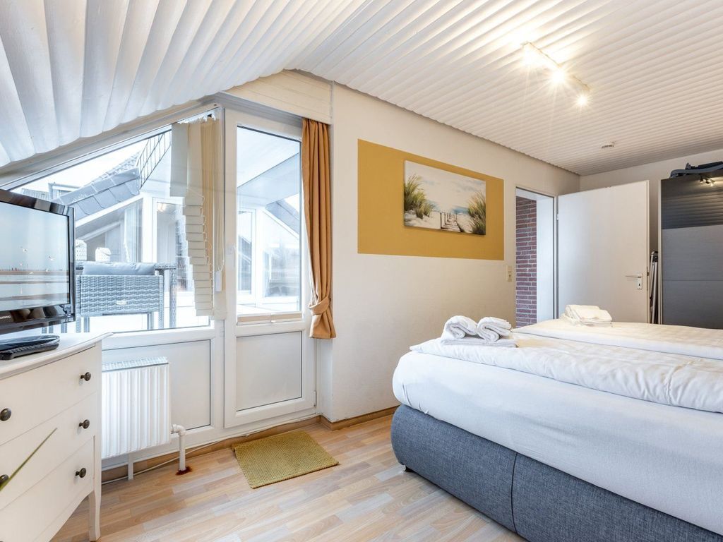 Schlafzimmer mit Balkonzugang
