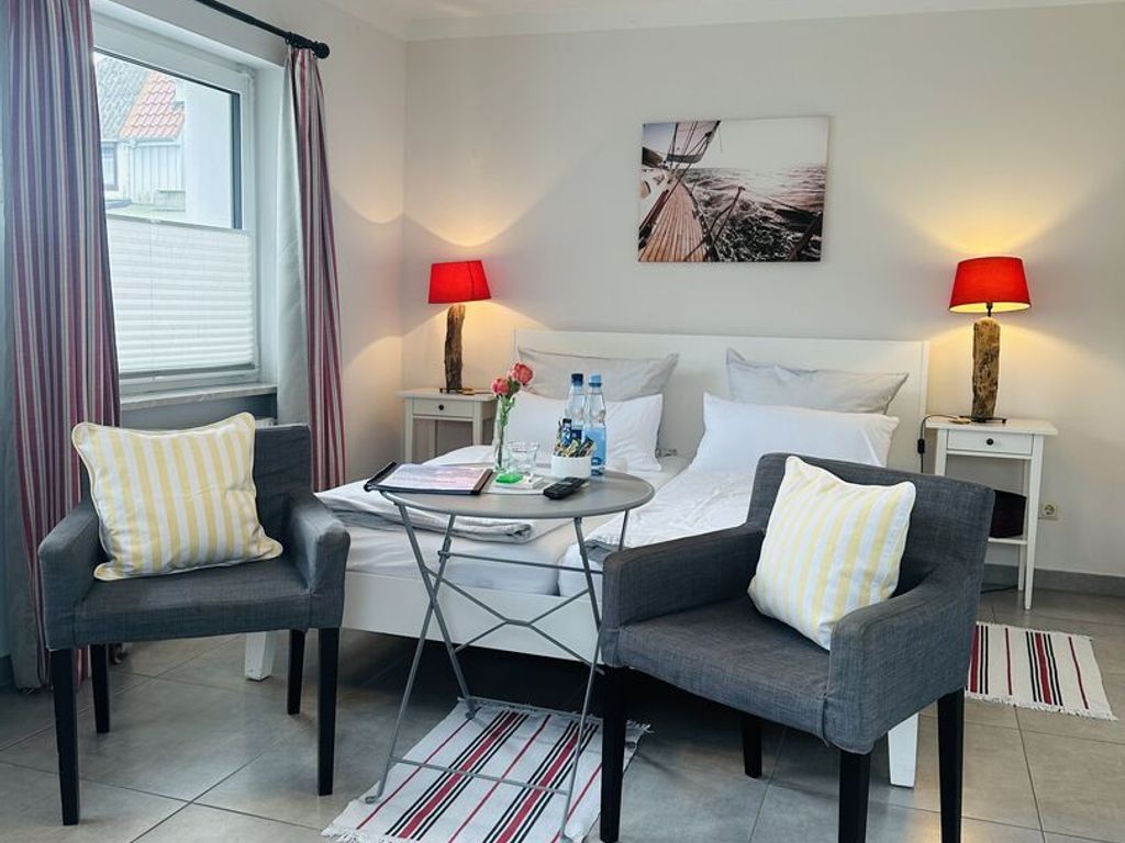 Schlafzimmer mit Doppelbett (1-Zimmer Apartment)