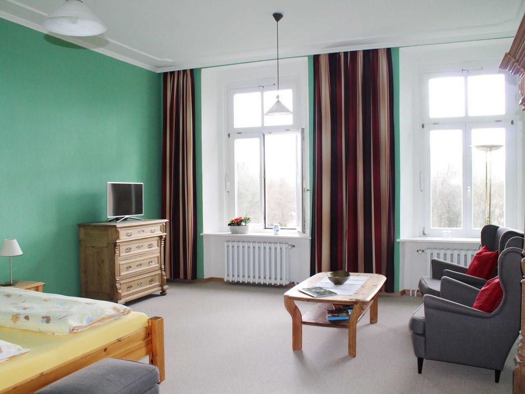 Schlafzimmer mit Sitzbereich