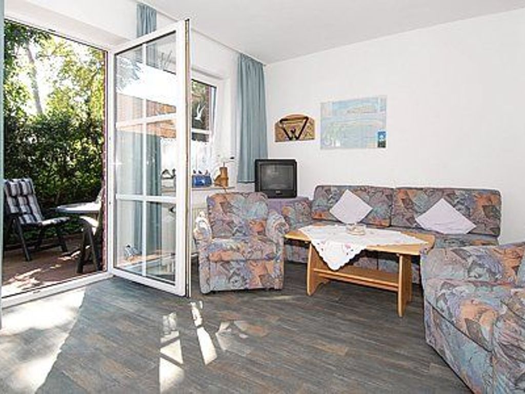 Wohnzimmer mit integriertem Küchenbereich