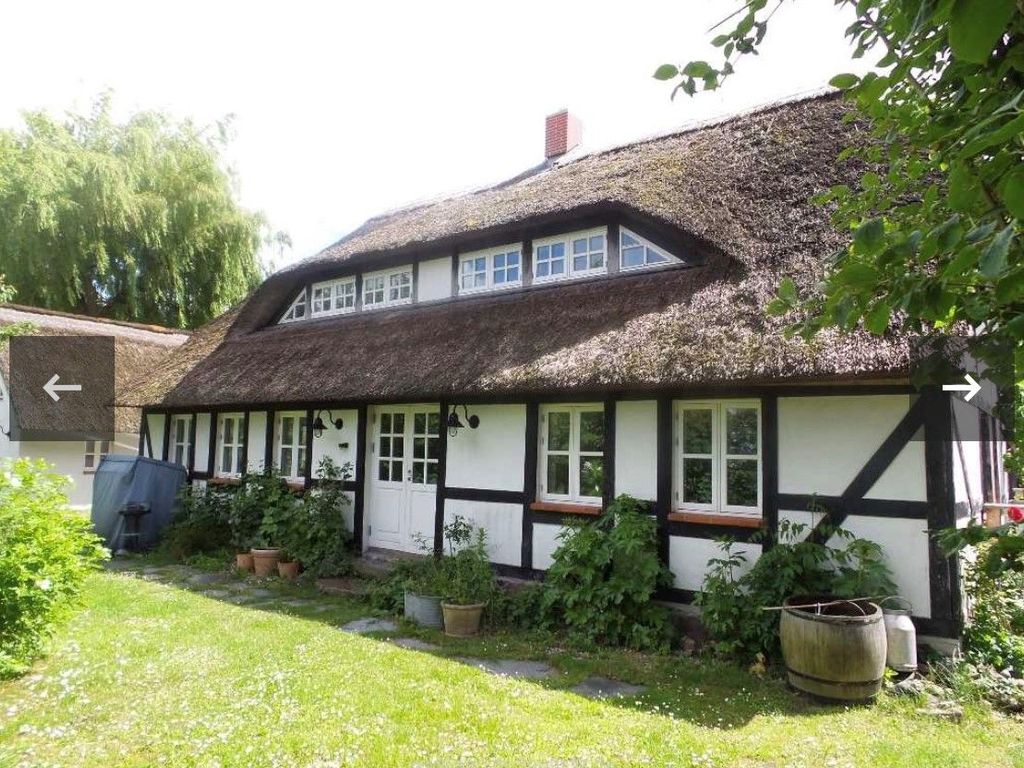 Mönchguter Ferienhaus unterm Reetdach mit Kamin