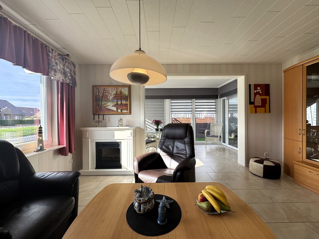 Wohnzimmer mit Wintergarten