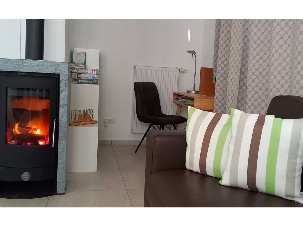 Wohnzimmer mit Kamin