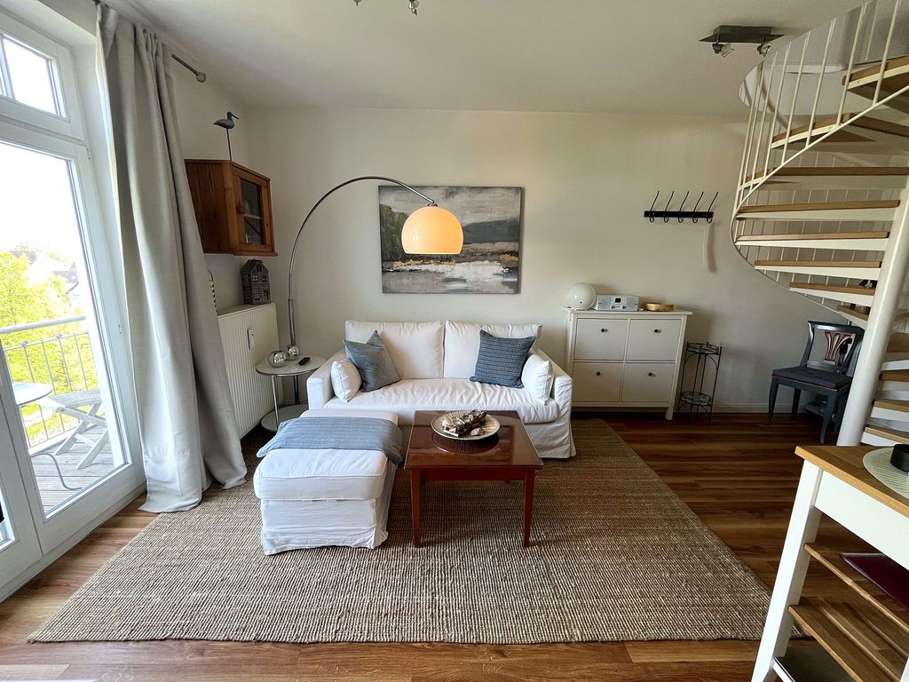 Die gemütliche Couchgarnitur im Wohnbereich der unteren Etage