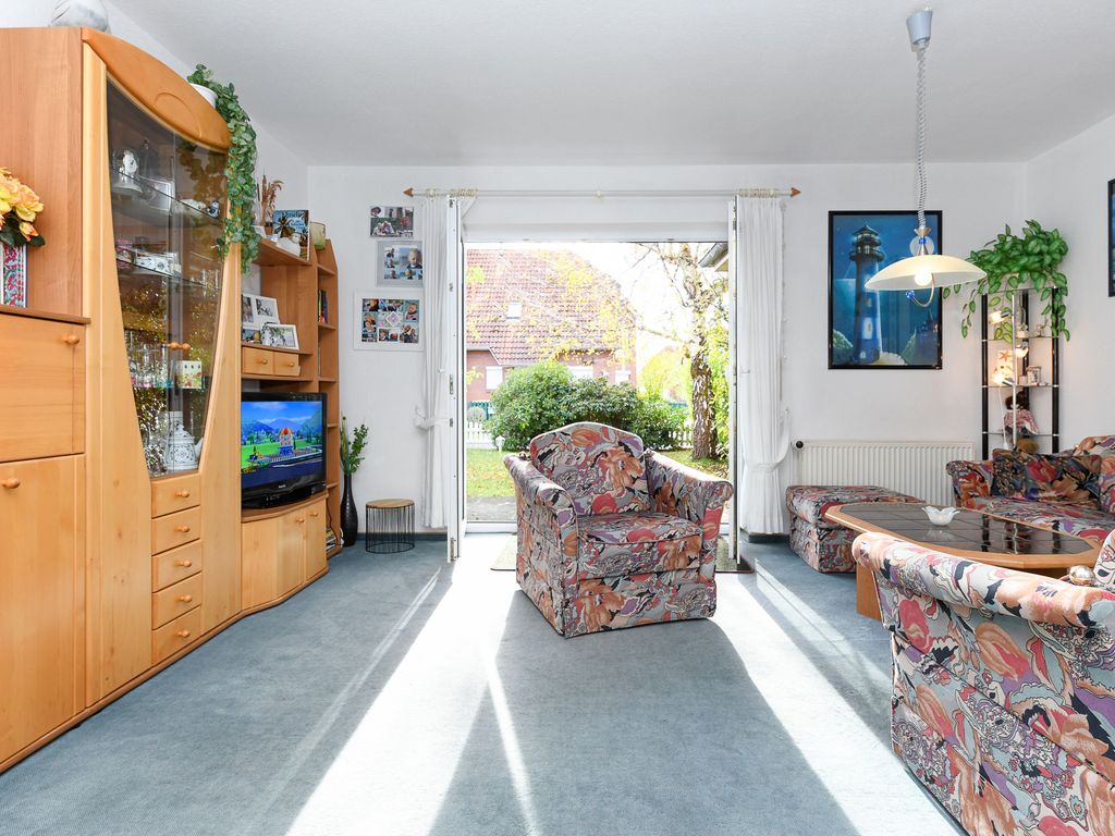 Wohnzimmer mit integriertem Küchenbereich