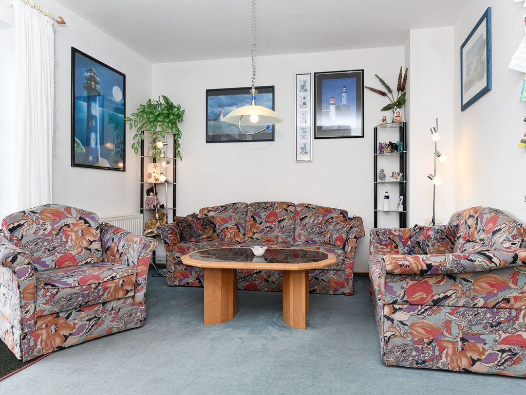 Wohnzimmer mit integriertem Küchenbereich