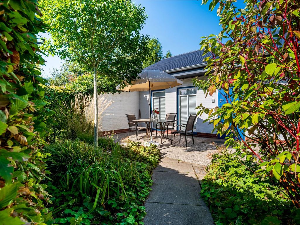 Ferienhaus Momme mit Sonnenterrasse - Deichhelden Nordstrand