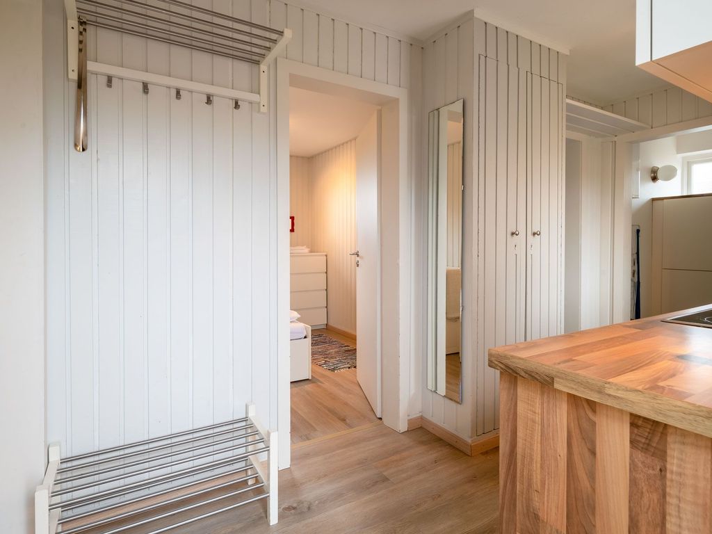 Ferienhaus Kai mit Garten - Deichhelden Nordstrand