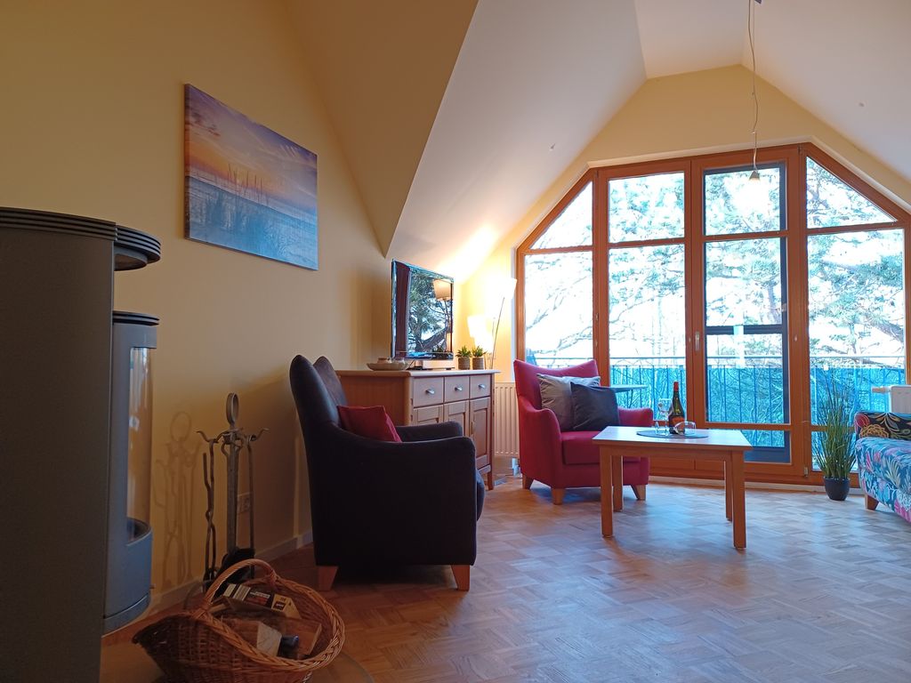 Wohnzimmer im 1. Obergeschoss
mit Kaminofen