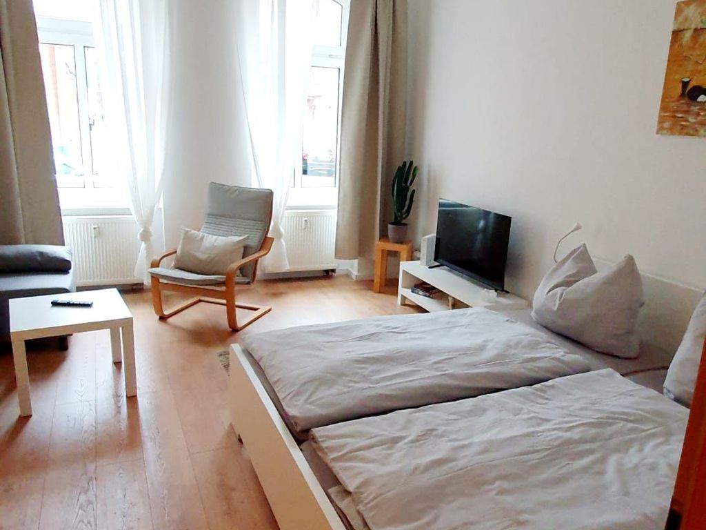 Wohnung Links: Kombinierter Wohn- und Schlafraum