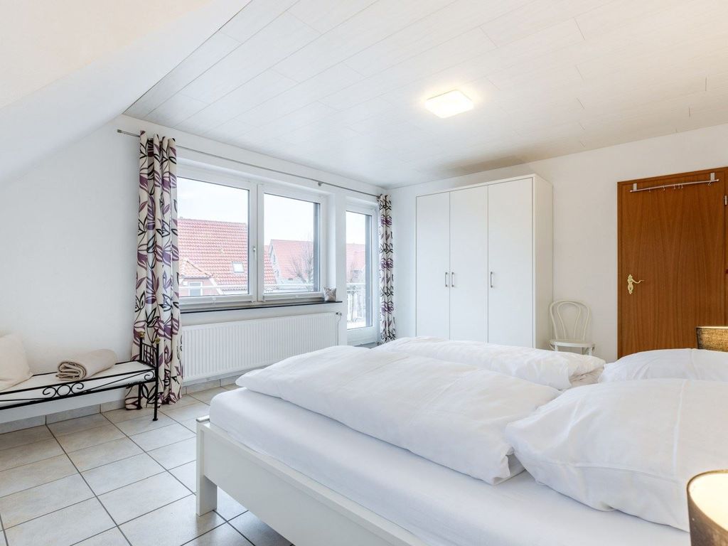 Schlafzimmer mit Balkon