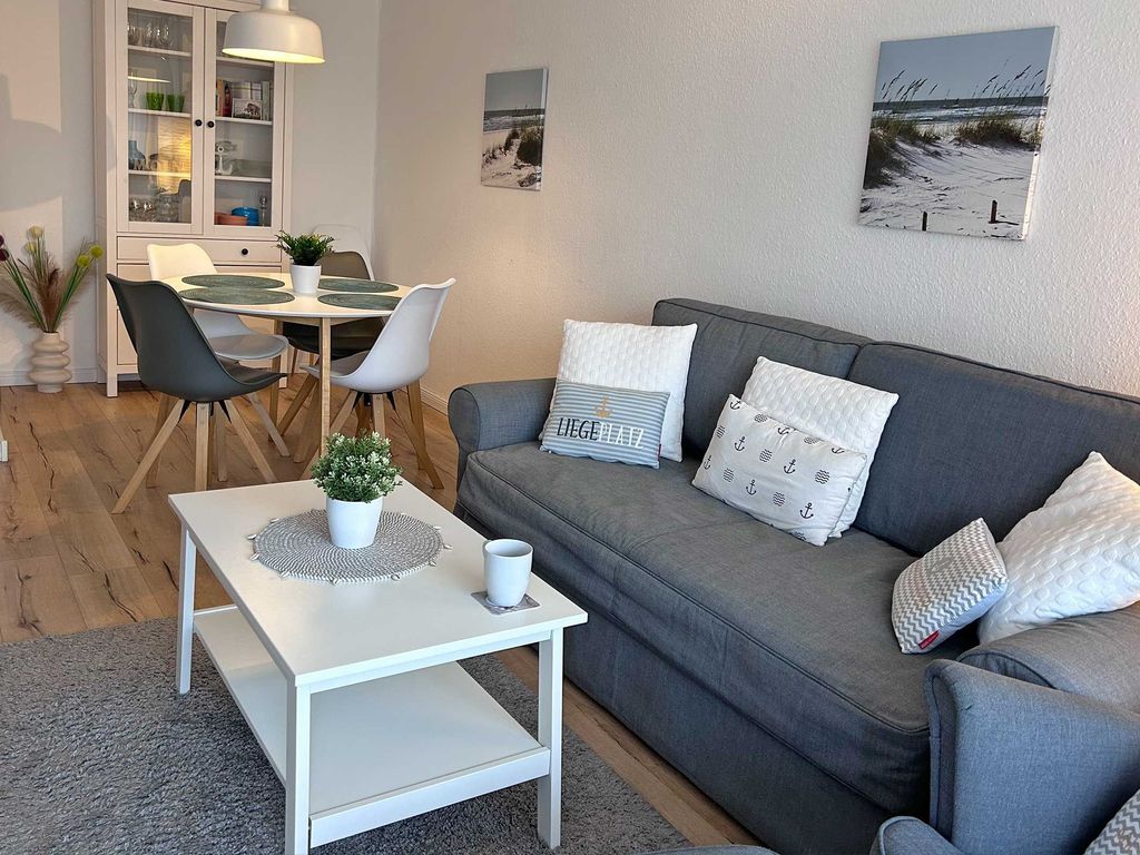 Wohnzimmer mit Schlafsofa