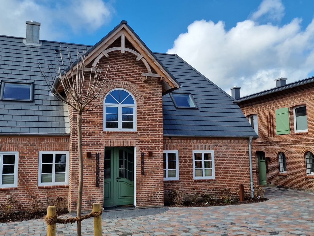 Haupthaus und ehemalige Scheune Hof Mühlenkoppel