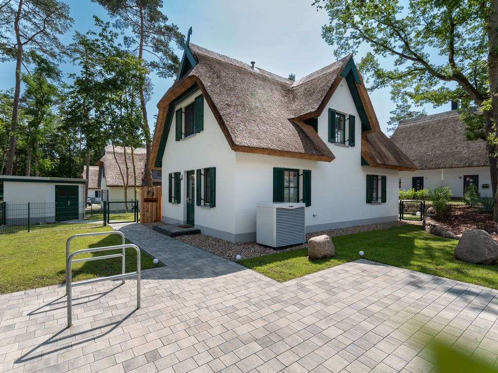 Aussenansicht und Parkplatz Ferienhaus Schmusedom