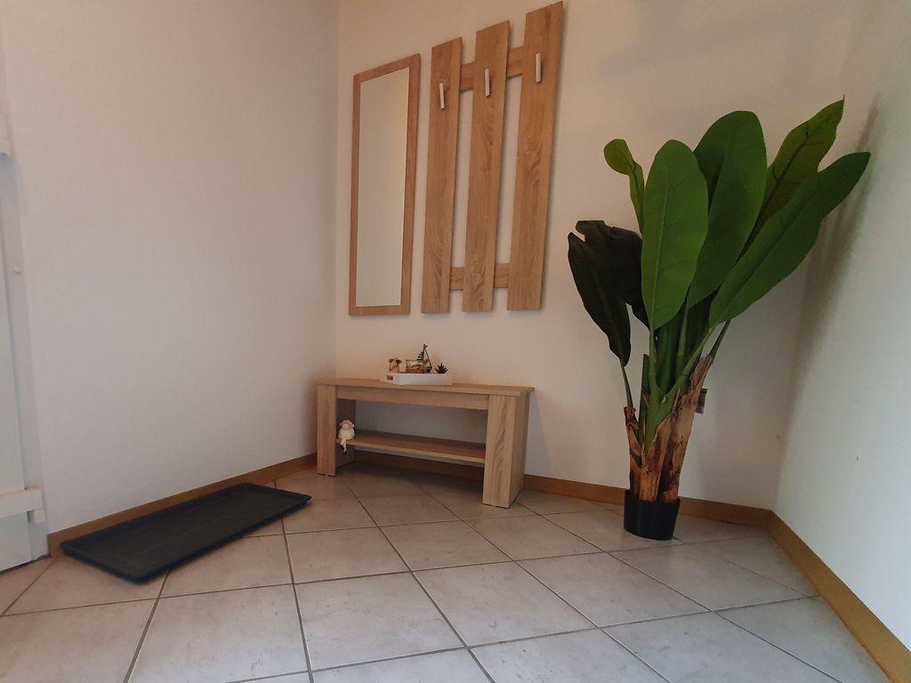 Ferienwohnung im Fehnland - Eingangsbereich mit Garderobe