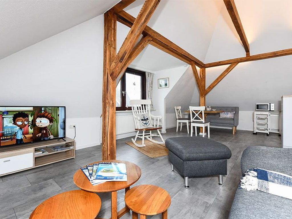 Wohnzimmer mit integriertem Küchenbereich