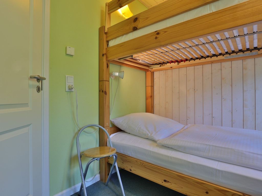 Landhaus Uhlenbusch - Blick in ein Schlafzimmer mit Etagenbett im EG