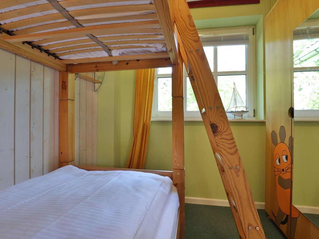 Landhaus Uhlenbusch - Blick in ein Schlafzimmer mit Etagenbett im EG
