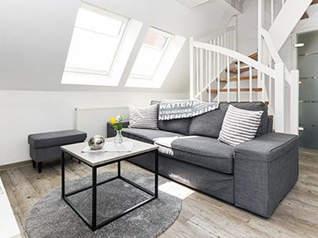 Wohnzimmer mit integriertem Küchenbereich