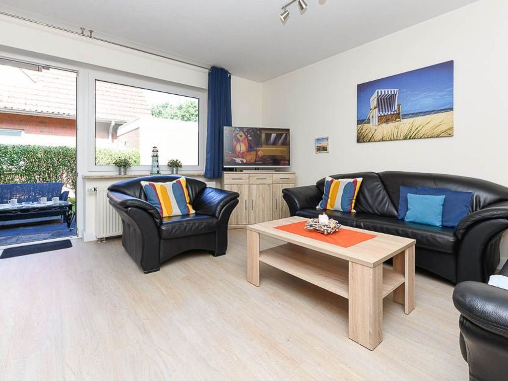 Wohnzimmer mit integriertem Küchenbereich