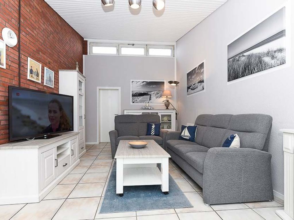 Wohnzimmer mit integriertem Küchenbereich