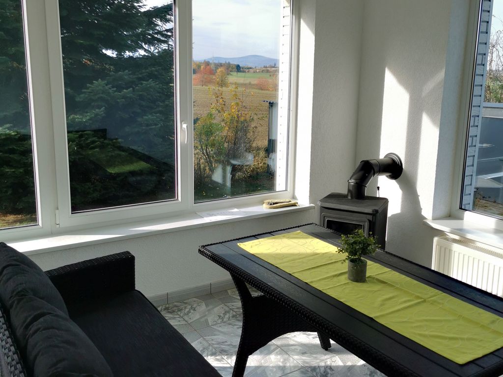 Wintergarten mit Kamin und zauberhaften Blick über die Felder zum Brocken
