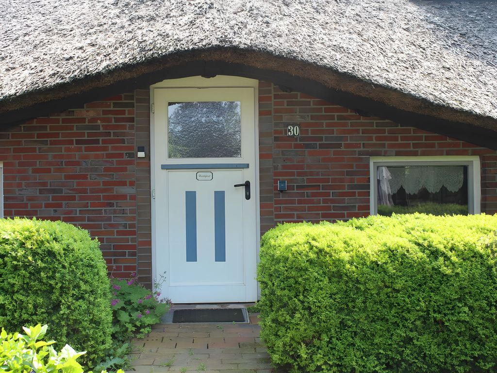 Reetdachhaus Am Deich - Ferienwohnung Heidefirst