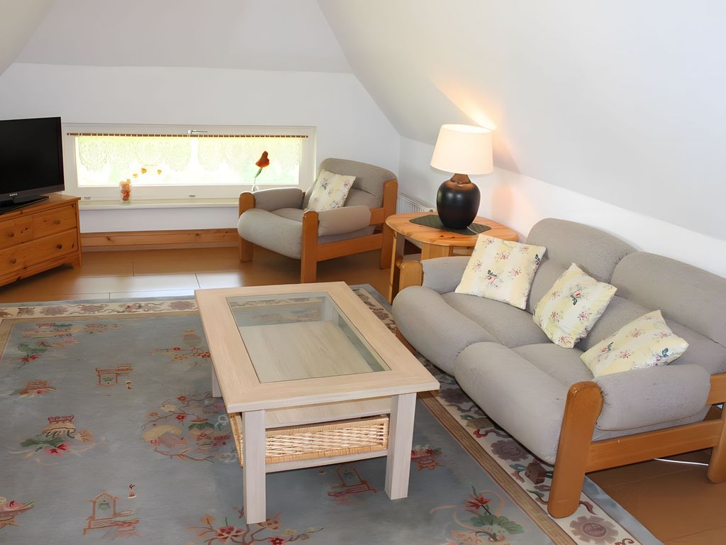 Wohnzimmer mit Flat-TV