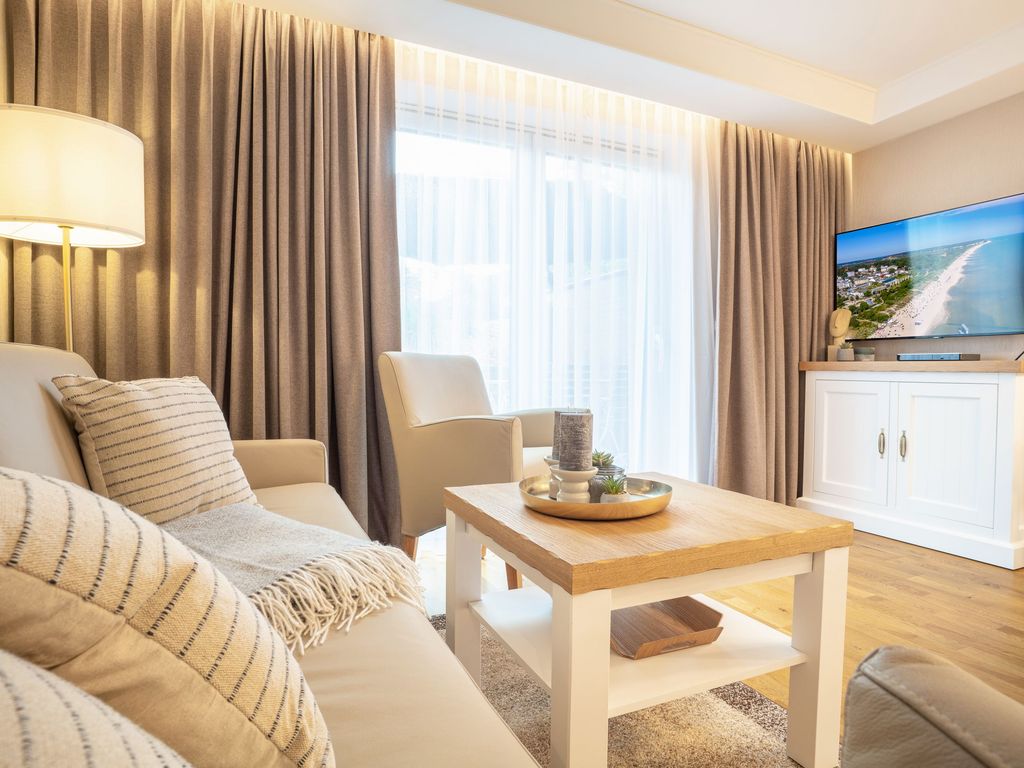 Wohnzimmer mit Flat-TV für entspannte Momente
