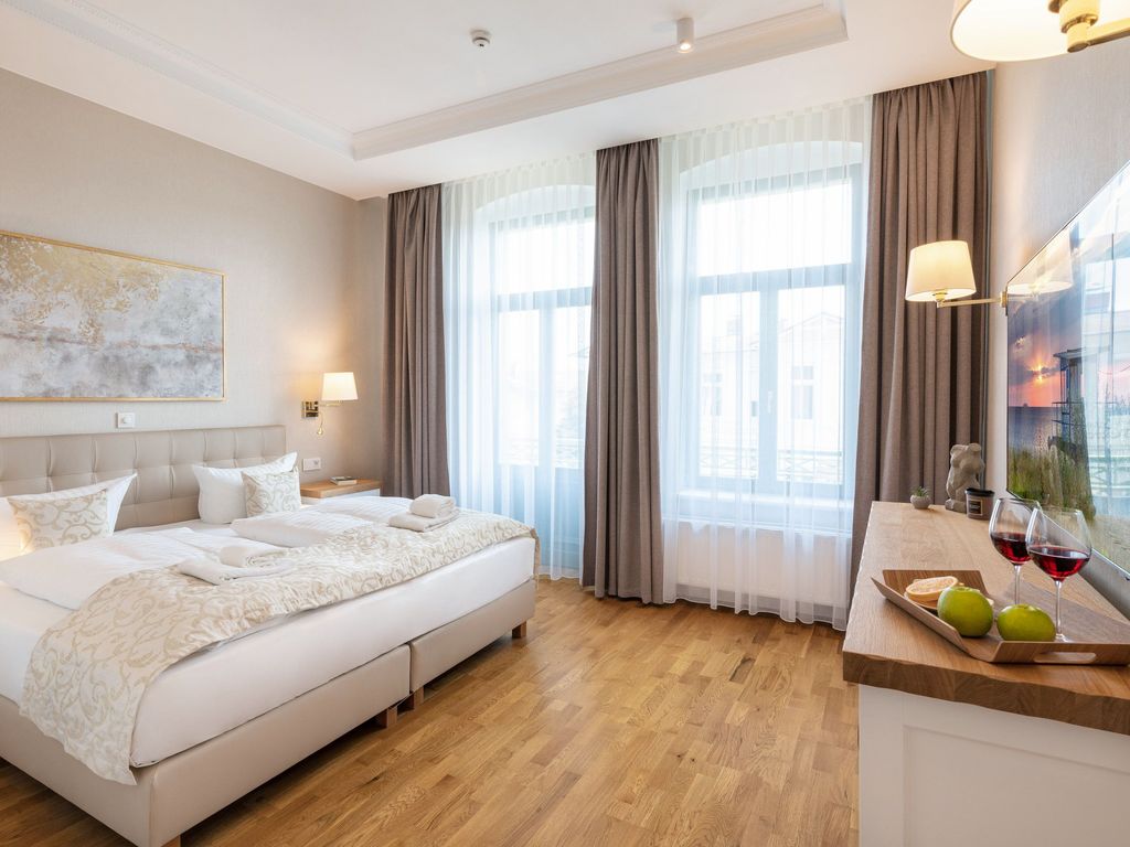 Schlafzimmer mit Flat-TV für gemütliche Stunden