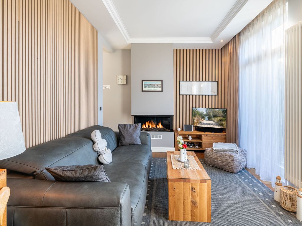Wohnzimmer mit Kamin