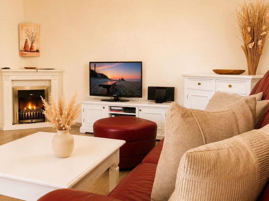 Gemütliches Wohnzimmer mit Kamin