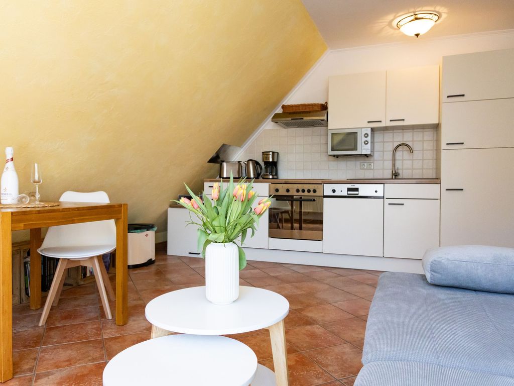 Wohnzimmer mit integrierter Küche
