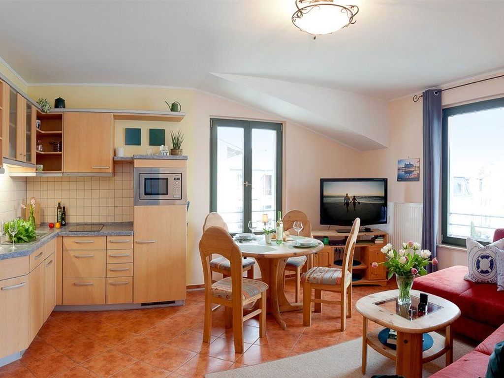 Wohnzimmer mit integrierter Küche