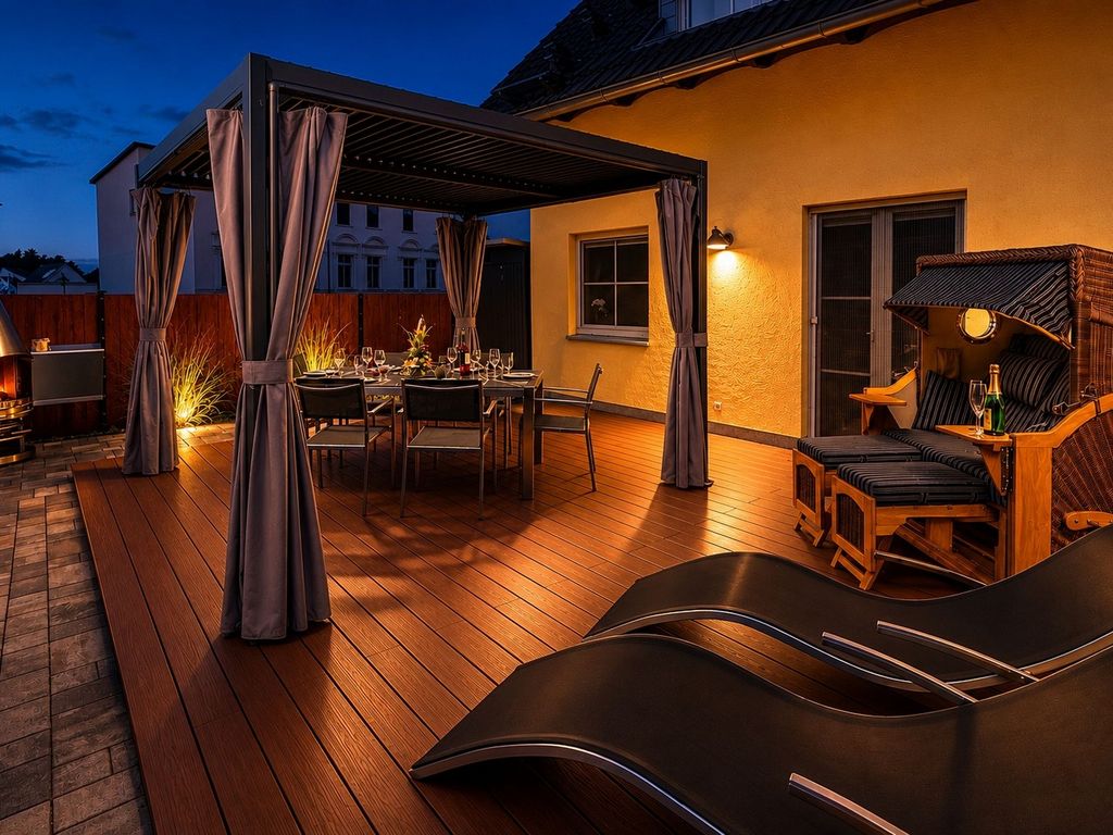 Terrasse mit Strandkorb und Dimaro Edelstahlgrill
