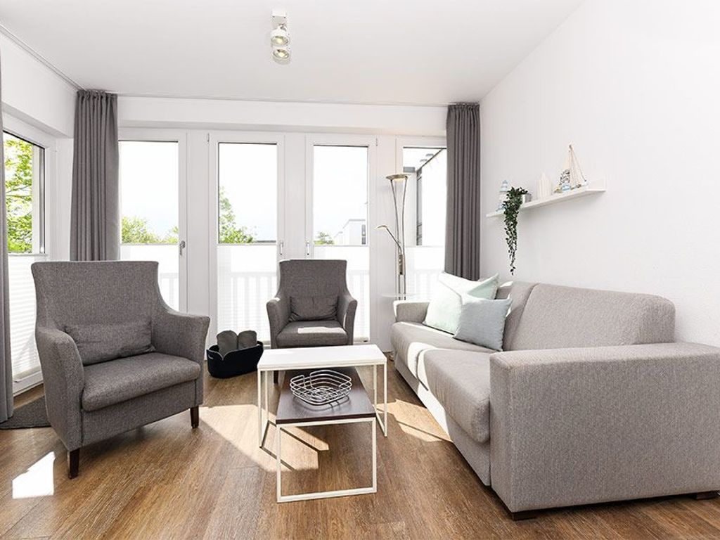 Wohnzimmer mit integriertem Küchenbereich