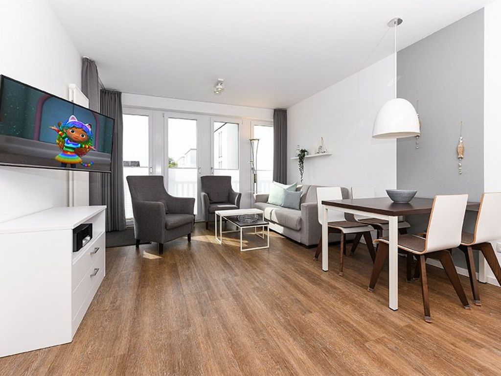 Wohnzimmer mit integriertem Küchenbereich
