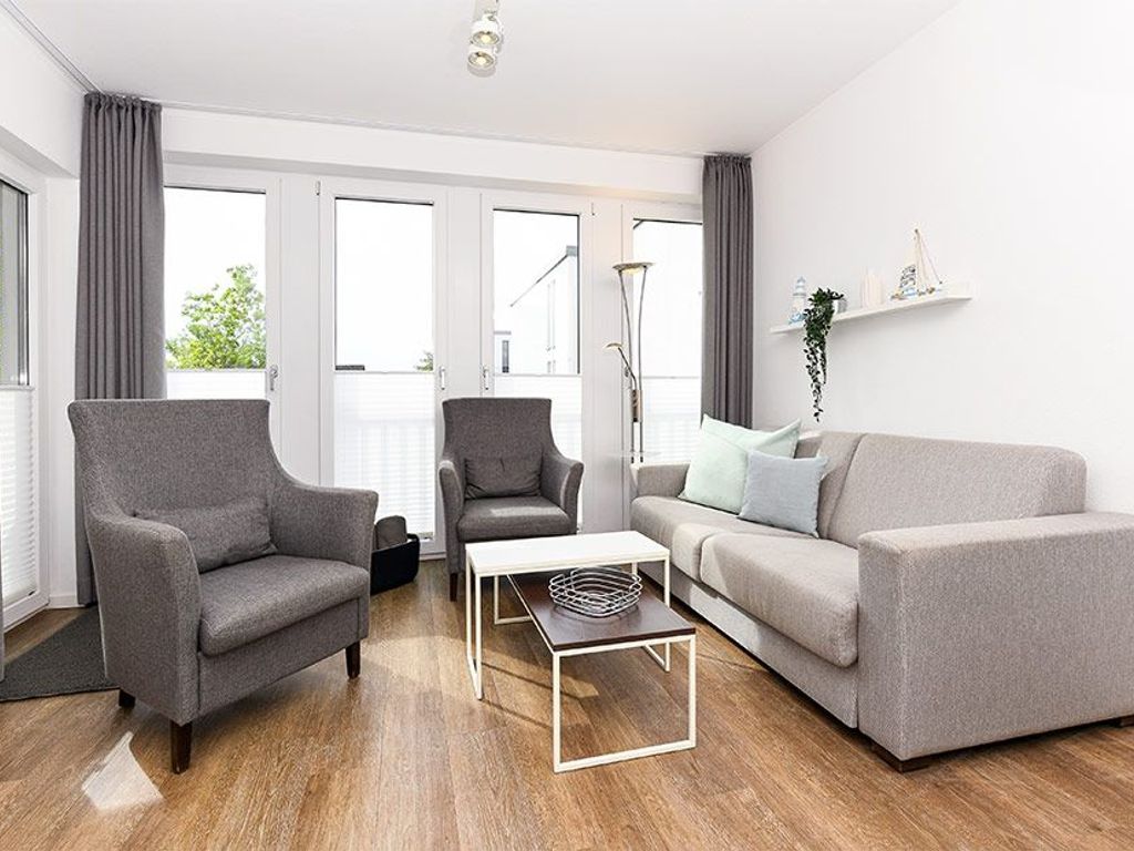 Wohnzimmer mit integriertem Küchenbereich