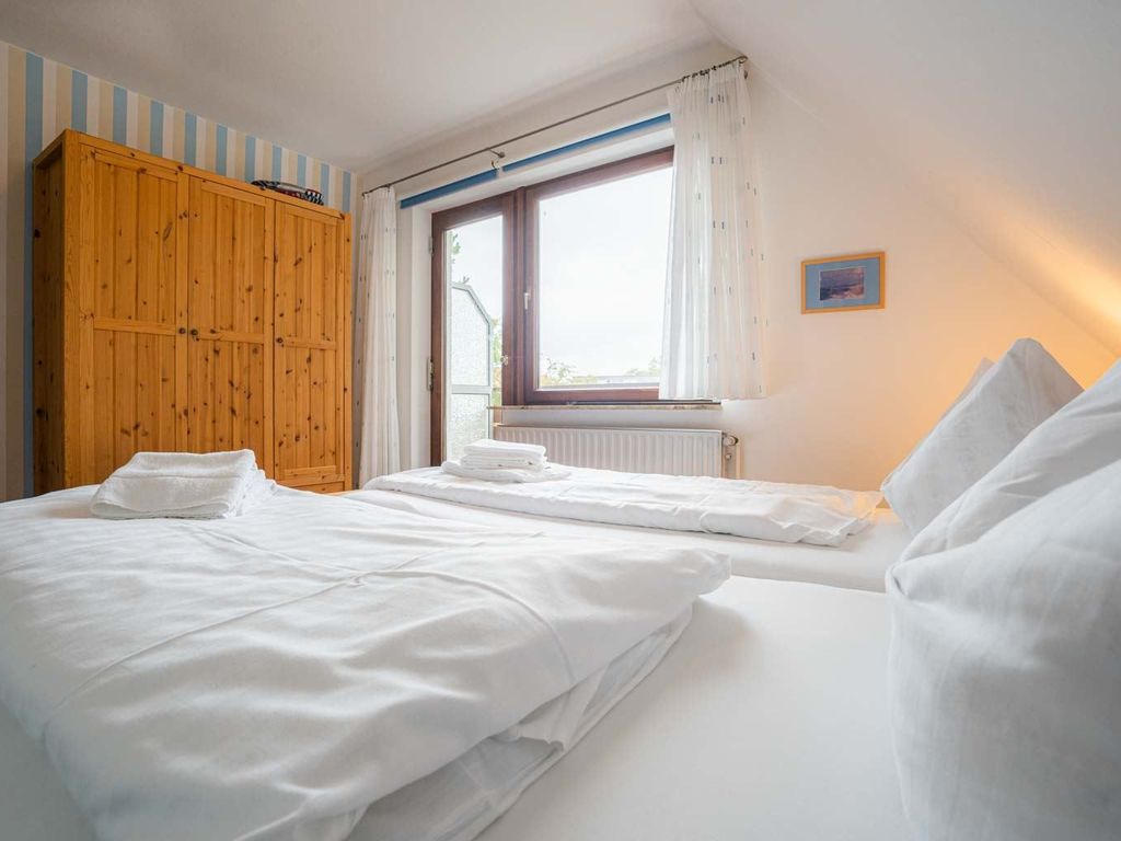 Schlafzimmer mit Balkon
