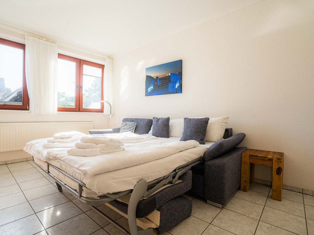 Wohnzimmer mit Schlafsofa