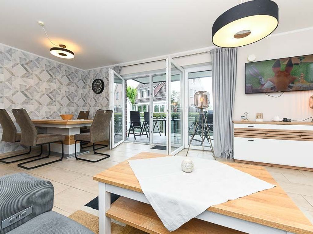 Wohnzimmer mit integriertem Küchenbereich