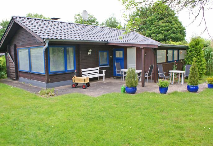 Blockhaus mit Wintergarten