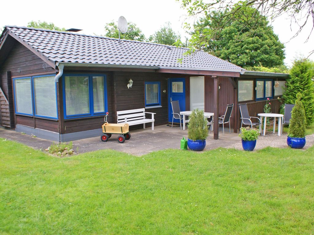 Blockhaus mit Wintergarten