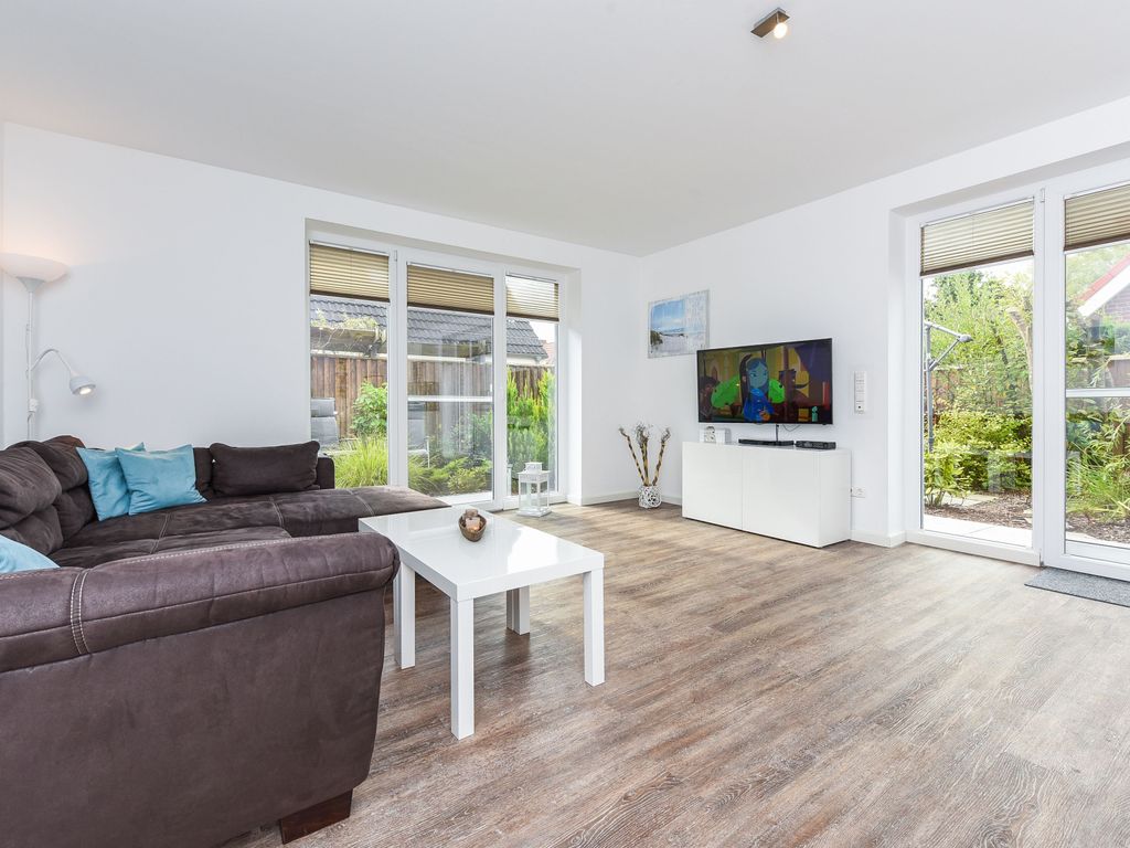 Wohnzimmer mit integriertem Küchenbereich