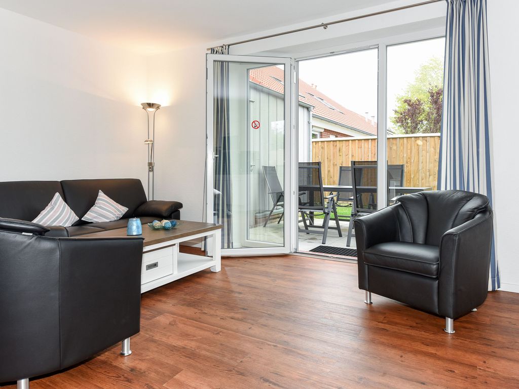 Wohnzimmer mit integriertem Küchenbereich